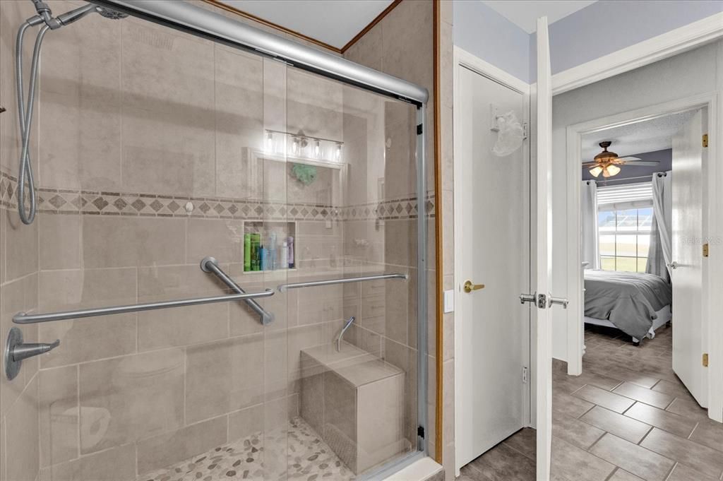 Beautiful Walk-in Shower with built-in bench seat