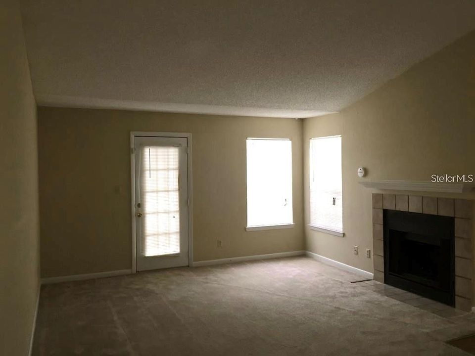 Living room with door to balcony