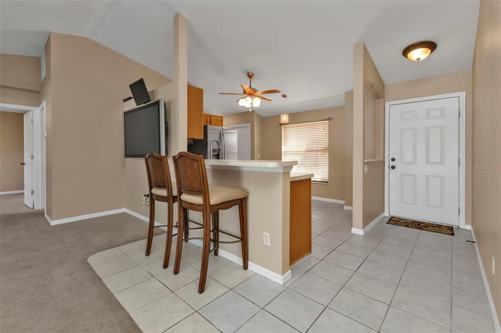 Kitchen opens up to living/dining area