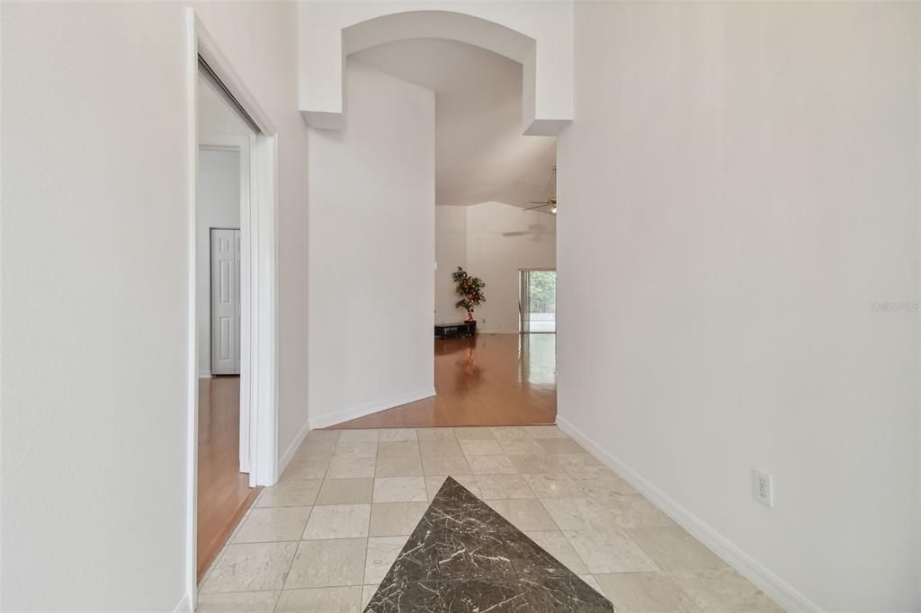 Foyer leading to living room