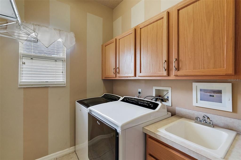 Inside Laundry Room with Plenty of Extra Storage