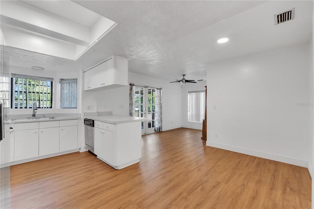 Dining room is connected to the kitchen with french doors to back deck.