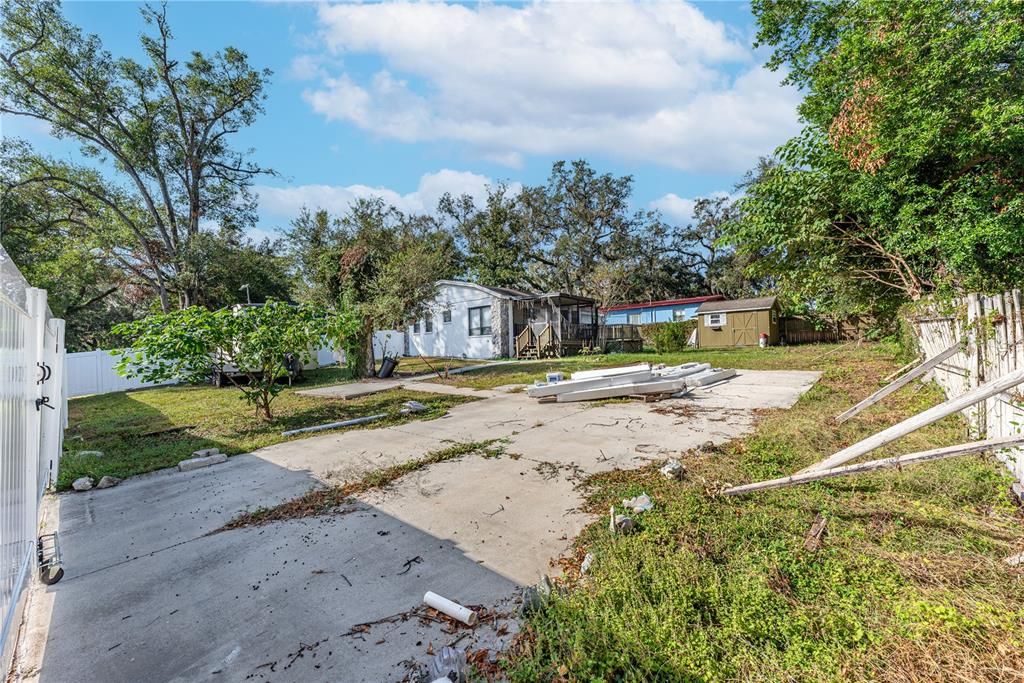 The oversized lot features a double gate and parking pad accessed from Ruth Place at the back of the yard, adding even more functionality to the property.