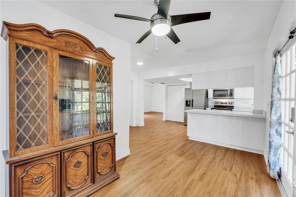 View from dining room to kitchen and living room beyond.