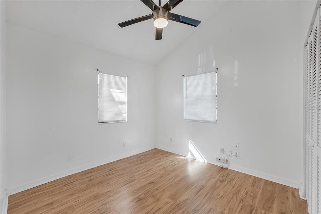 Bedroom #2 on the opposite side of this home is 10x10 with a vaulted ceiling.