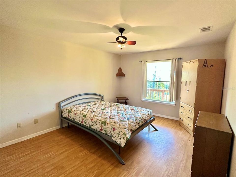 Bedroom - with window Balcony view.