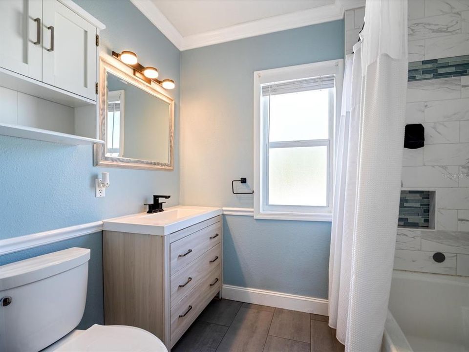 Upstairs full bathroom has been remodeled w/ tub/shower combo