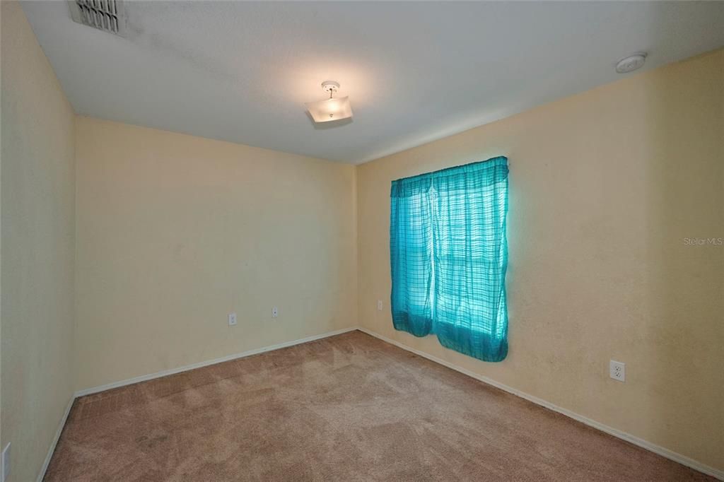 Guest bedroom at the front of the home