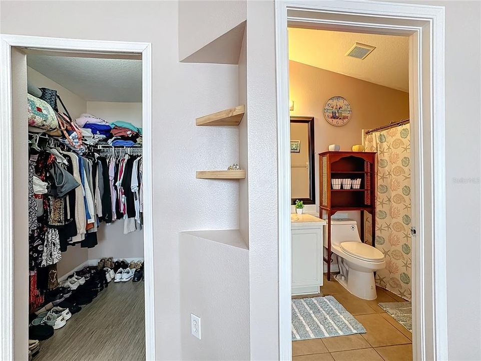 PRIMARY BEDROOM WITH WALK-IN CLOSET AND EN SUITE BATHROOM