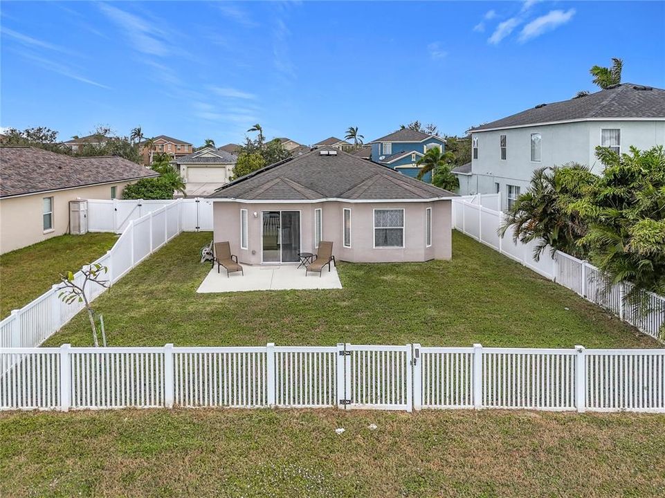 FULLY FENCED YARD WITH POND VIEW