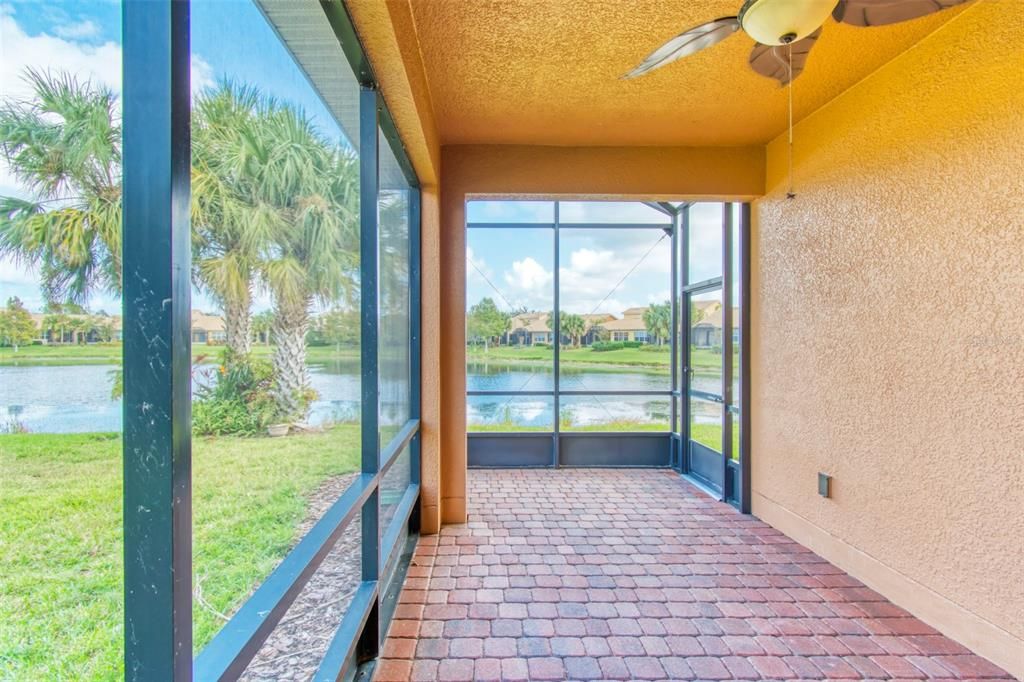 Palms tree, pines, mature landscaping rounds this view of the water out