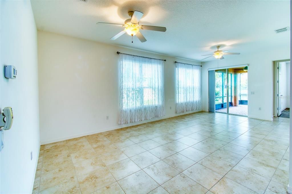 The GREAT ROOM is filled with natural light - 2 large double windows and sliders bring the outside in!