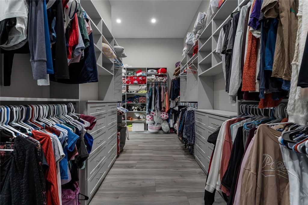 Primary Closet: A dream closet come true! Built-in California closets provide ample storage and organization, customized for your every need.