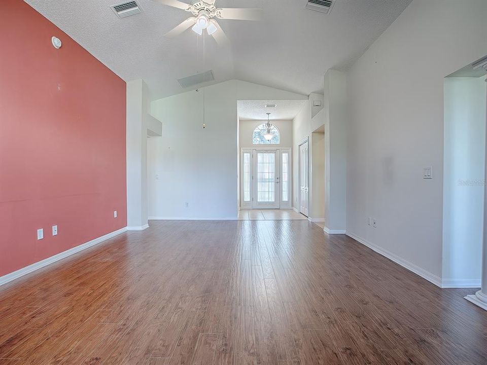 HIGH, VAULTED CEILING AND GORGEOUS FLOORING