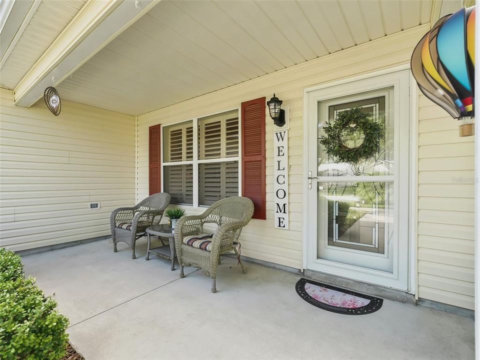 Front Porch with Screen Door and Leaded Glass Insert in the Front Door