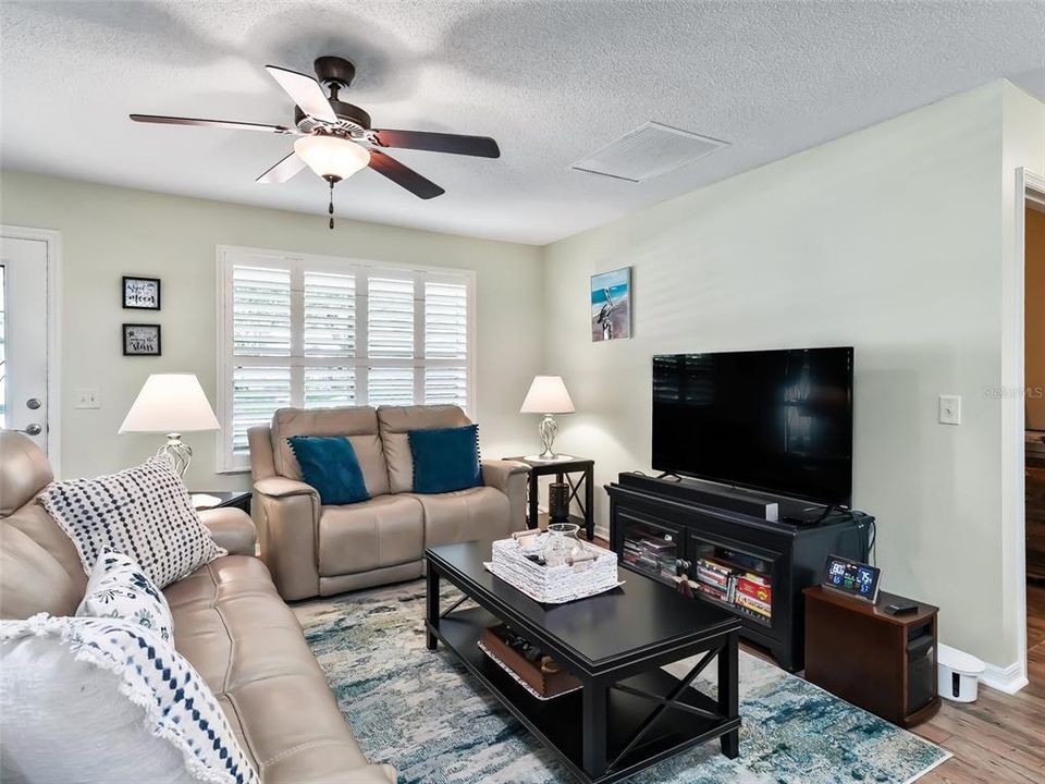 Living Room with Plantation Shuteers Throughout