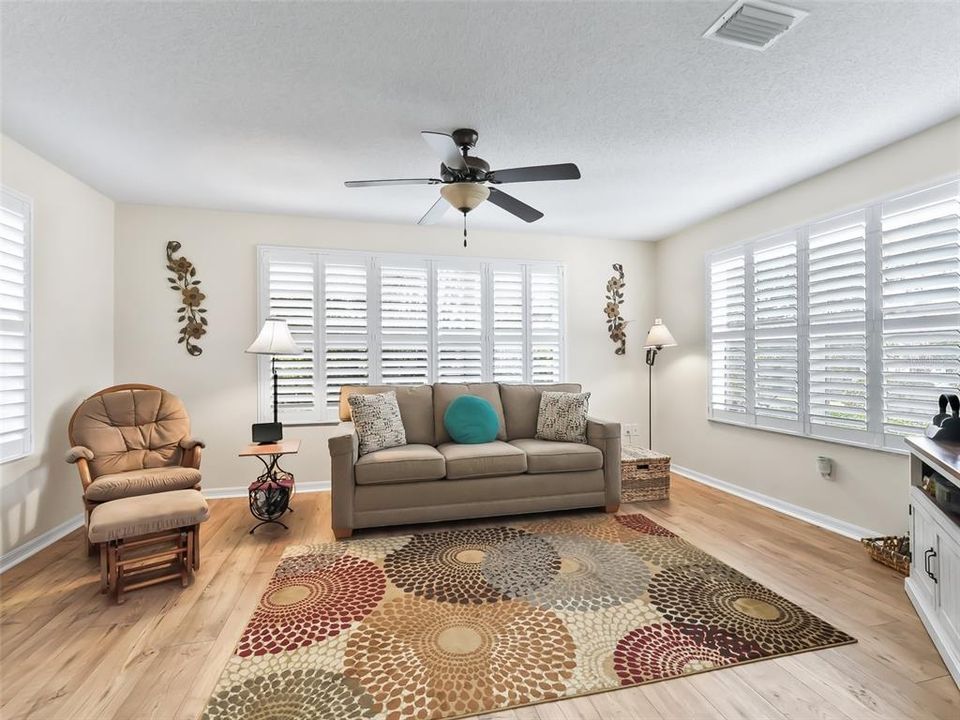 Large Florida Room leading out to the Private Yard and Large Birdcage