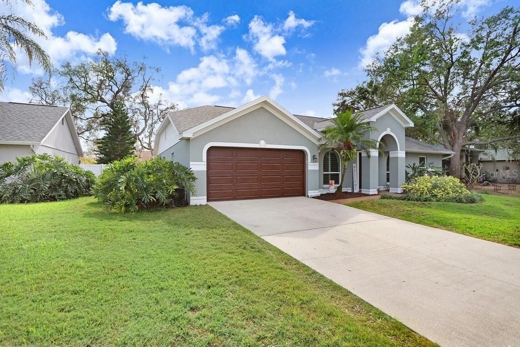 Beautiful, newer garage door and front door!