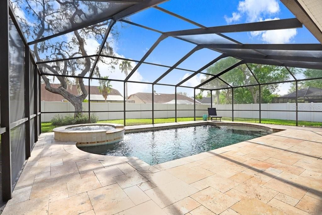 The pool and patio were redone in 2017. New pebble pool finish, new hot tub, new sunshelf, travertine tile, all new pool equipment, and added a pool heater too!