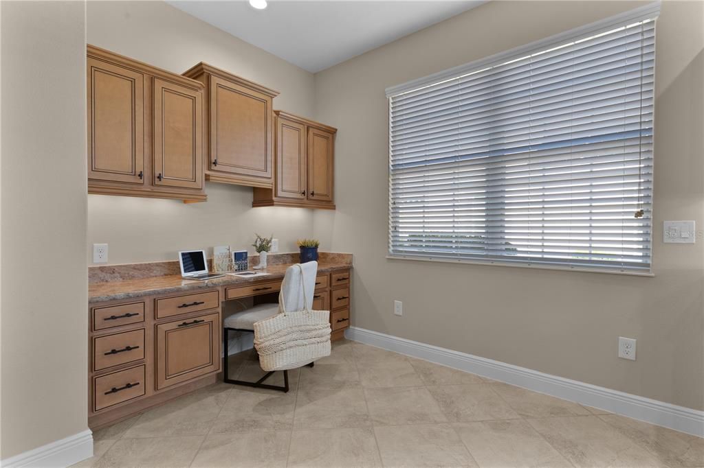 Bonus space in the kitchen can serve as an office, coffee or wine bar!