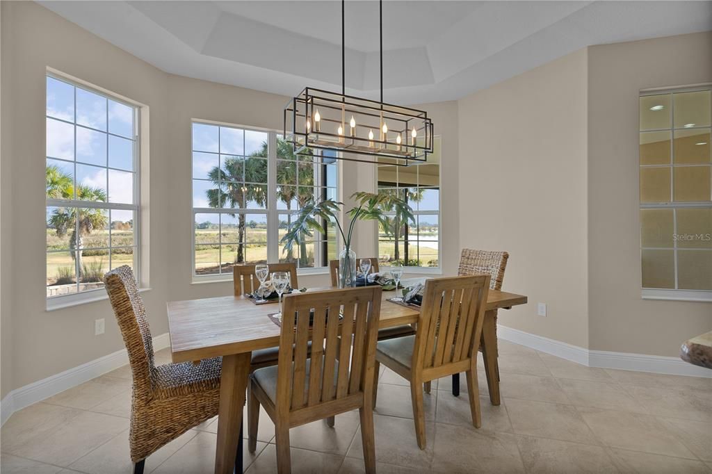 OVERSIZED Bay Windows in the dining room overlook the views