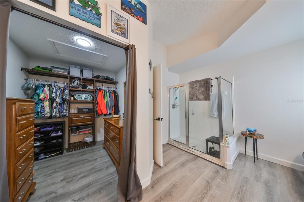 Primary - Large Walk in Closet w/Organizers & Walk in Shower