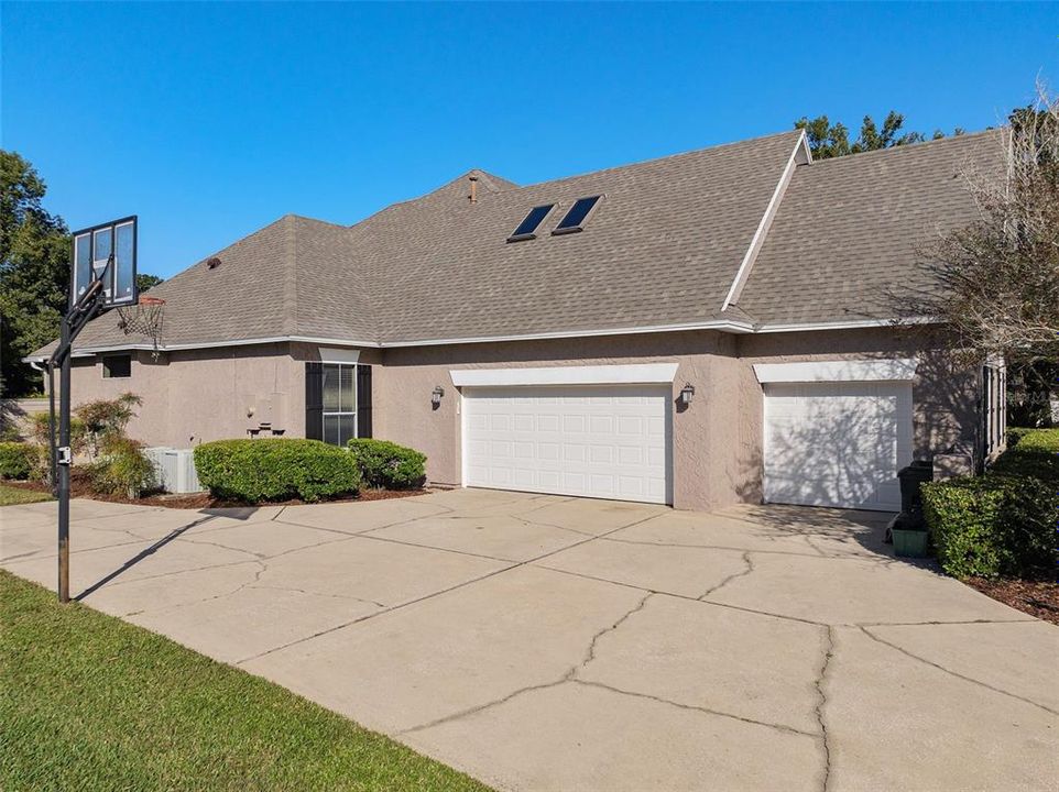 Three car side entry garage