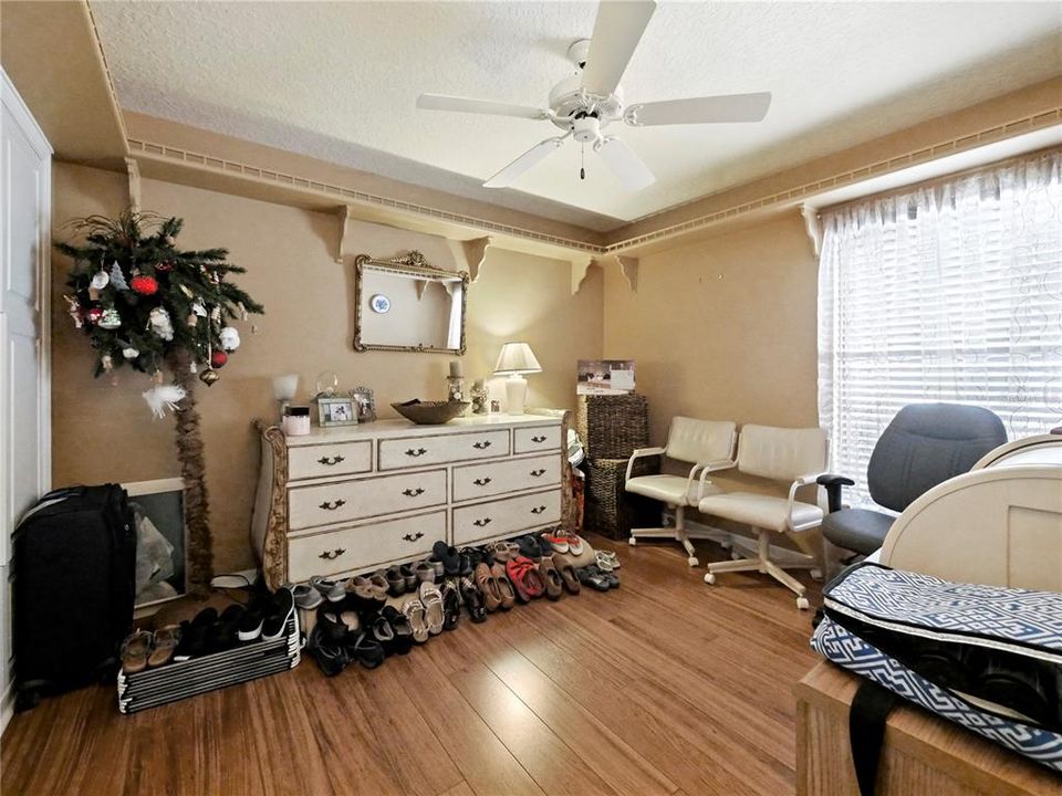 Front Bedroom with Custom Closet with Plenty of Storage Cabinetry