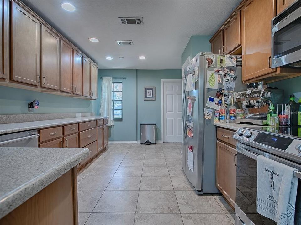 Kitchen view with garage access door