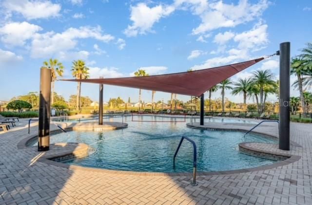 Outdoor pool with volleyball area