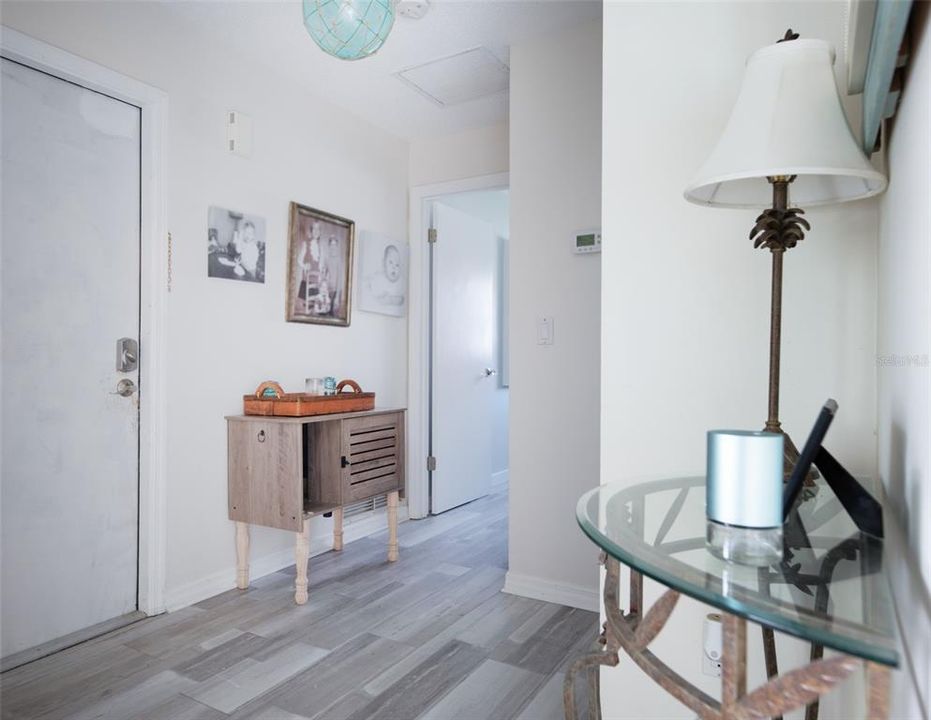 Hallway to Laundry and Primary Bedroom