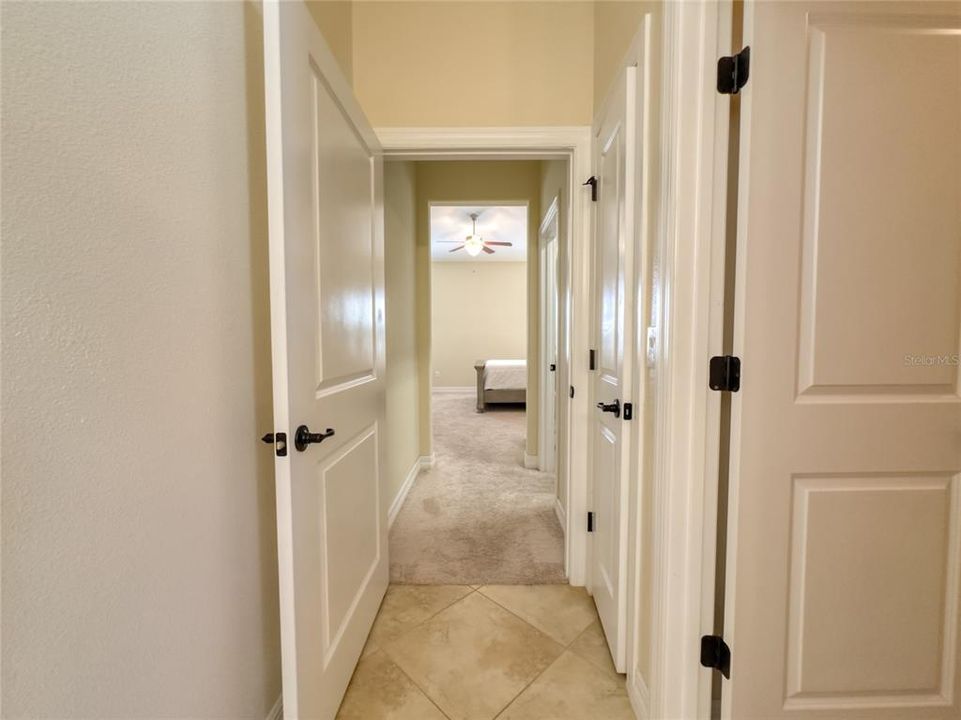 Primary bedroom hall to bathroom