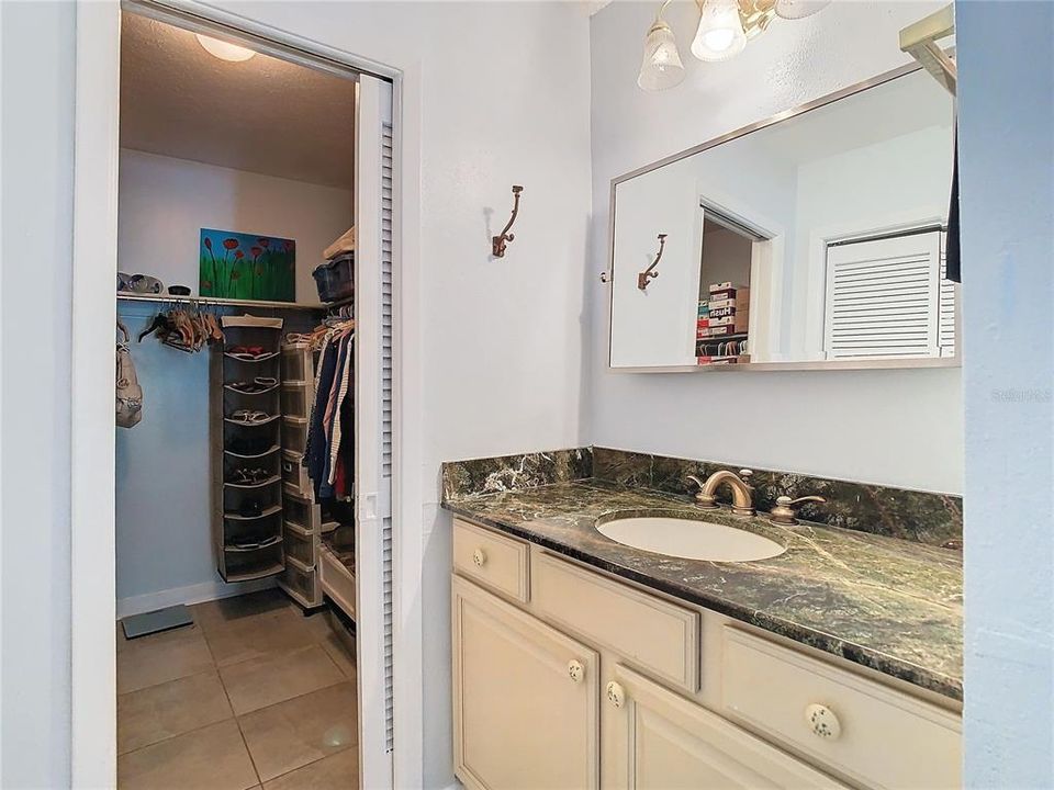 Split master vanity at walk-in closet