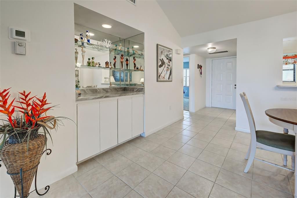 This area has water lines that were capped off but a sink  for a wet bar can be added,