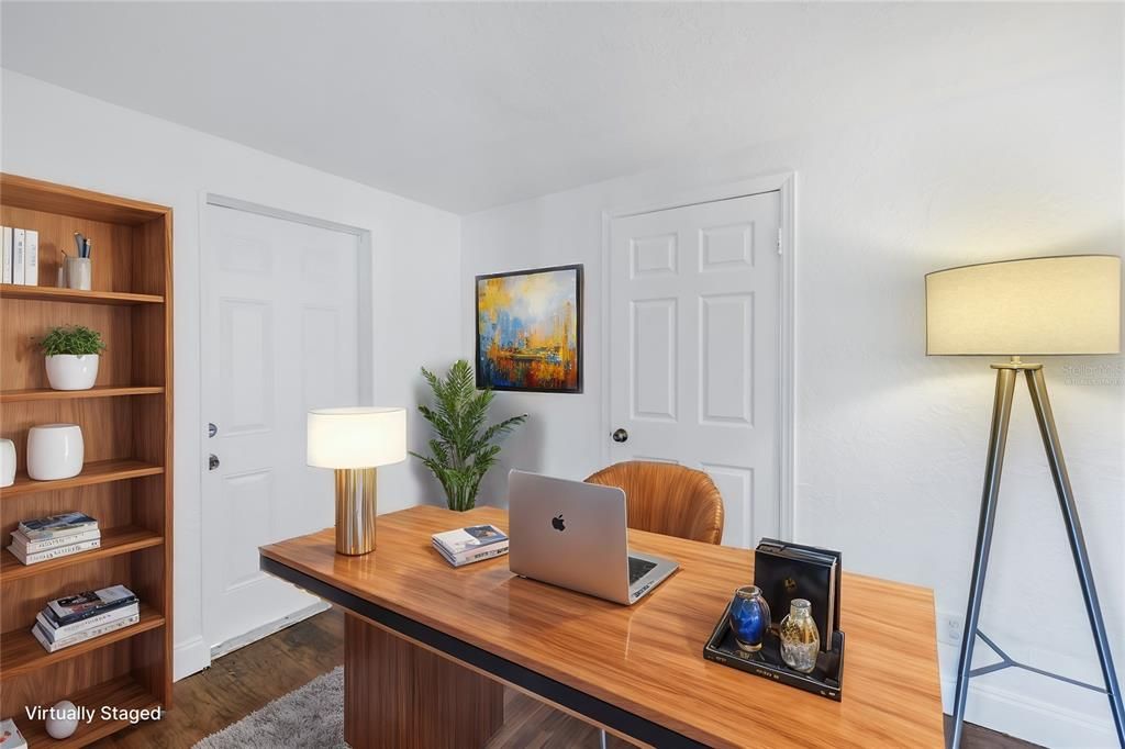 Virtually staged office/versitile bonus room.