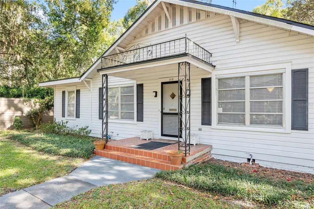 VINTAGE CRACKED TILE PORCH SETS THE TONE