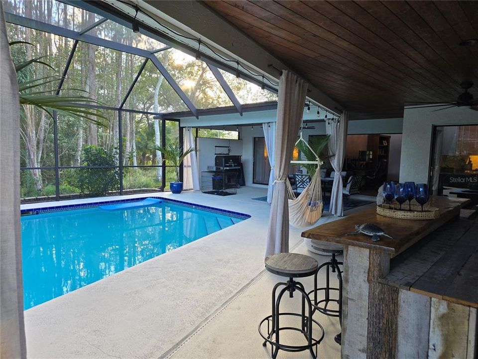 1500 SF outdoor pool with covered patio