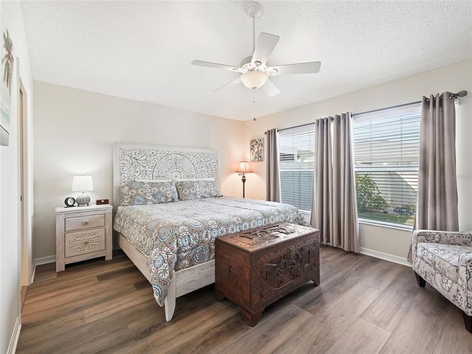 PRIMARY BEDROOM with enormous windows.