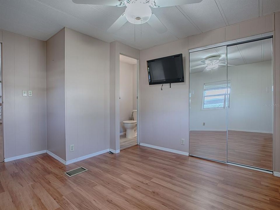 Primary Bedroom with Large Closet and built in drawers