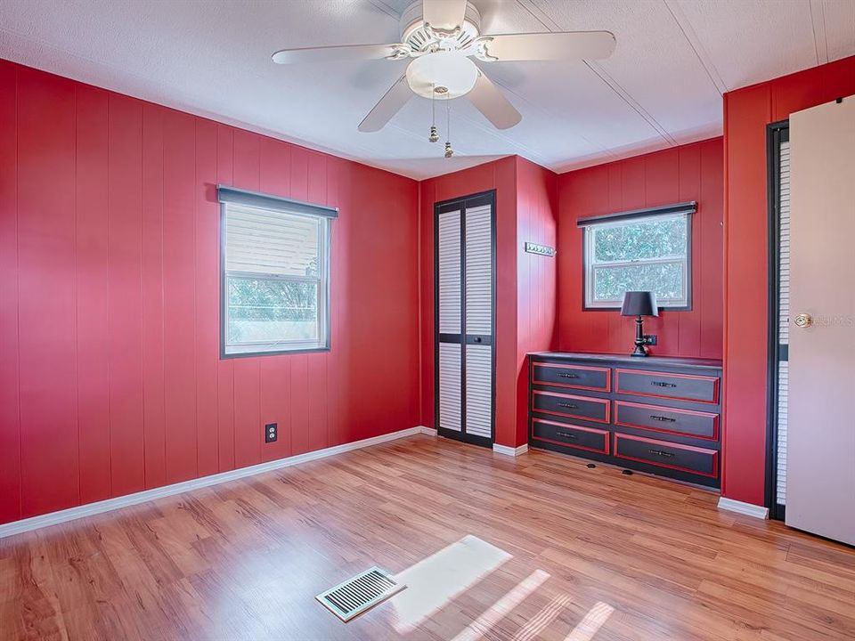 Guest Bedroom with Double Closets and Built In Dresser