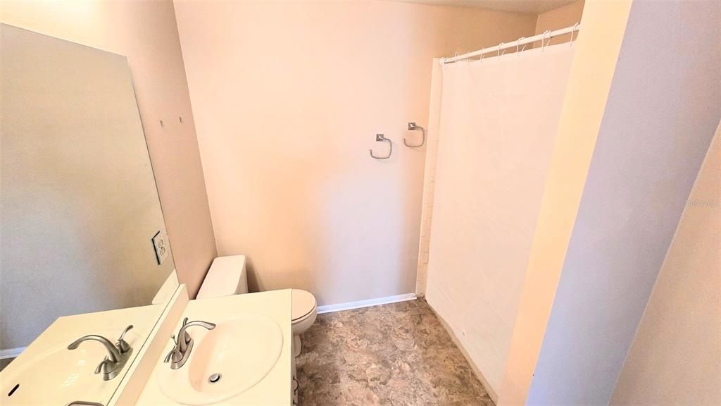 Guest Bathroom - Tub with shower