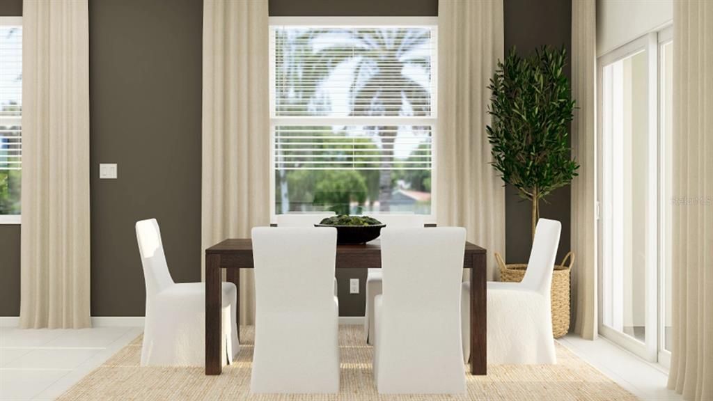 Enjoy sun-dappled meals at this charming Dining Room, which showcases immediate access to the covered patio for a breath of fresh air. This is a photo of the model home for illustration only.