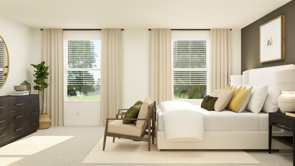 The primary bedroom features ample space for a relaxing sitting area and plush wall-to-wall carpeting with padding to deliver enhanced comfort. This is a photo of the model home for illustration only.