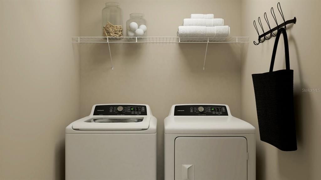 Situated on the second floor with all the bedrooms is a convenient laundry room to help simplify home organization and everyday tasks. It comes fully equipped with a new washer and dryer. This is a photo of the model home for illustration only.