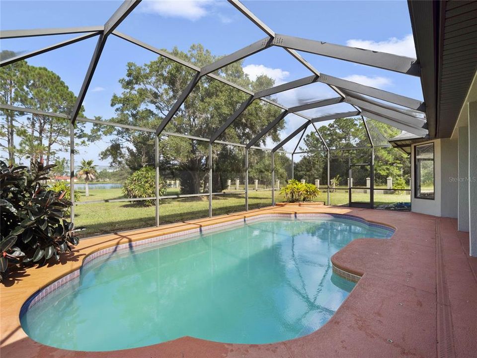 SCREENED POOL HAS LAKE VIEWS!