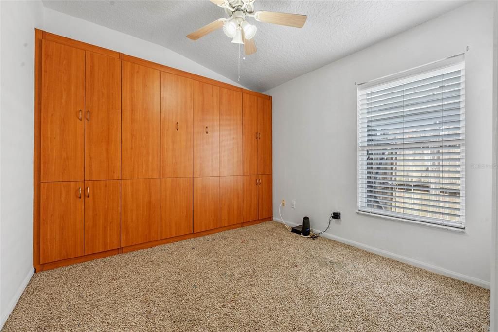 Bedroom three features a built-in murphy bed for added storage perfect for guests!