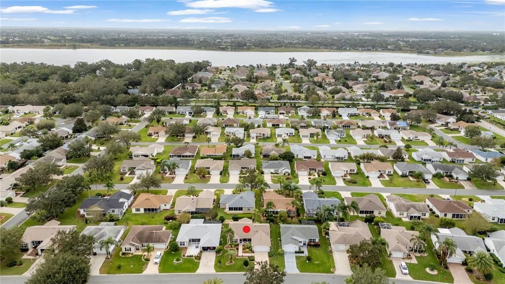 AERIAL looking South, featuring Lake Miona (deep), Lake Miona Park - Public Access to Lake Miona (mid left), and Rainey Trail / CR 472 (center)