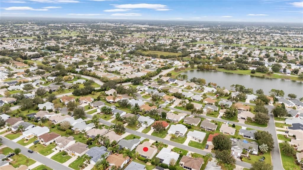 AERIAL looking Northwest, featuring CR 466 Commercial Corridor (deep R to L), Ashland Pool and Postal Station (center right, north of pond), Pimlico Executive GC (center right), Churchill Greens Executive GC (deep left)