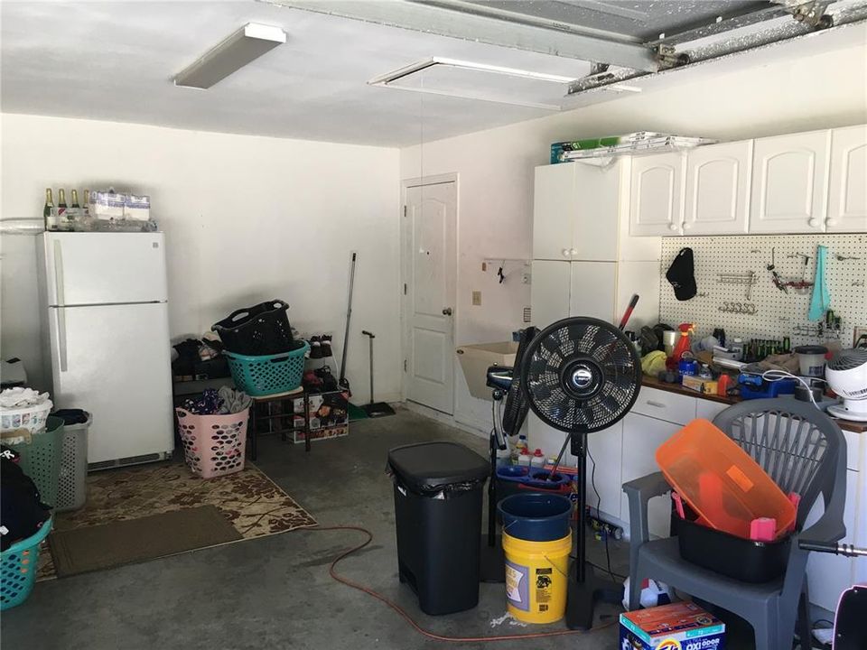 Garage with Entrance to Home