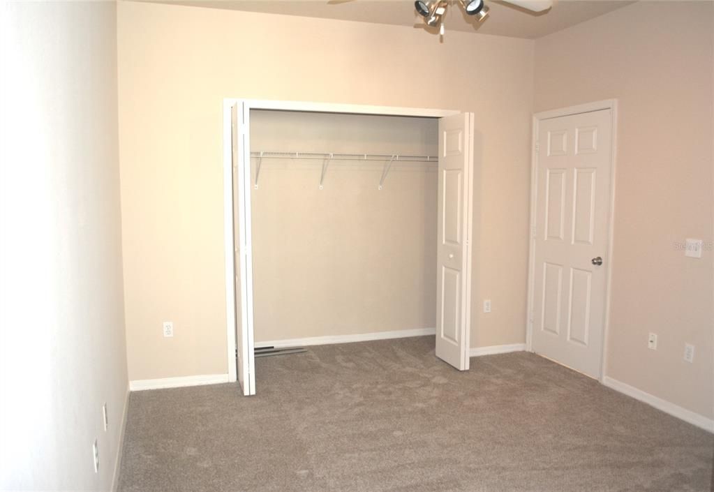 2nd Bedroom closet and access door to 2nd Bathroom